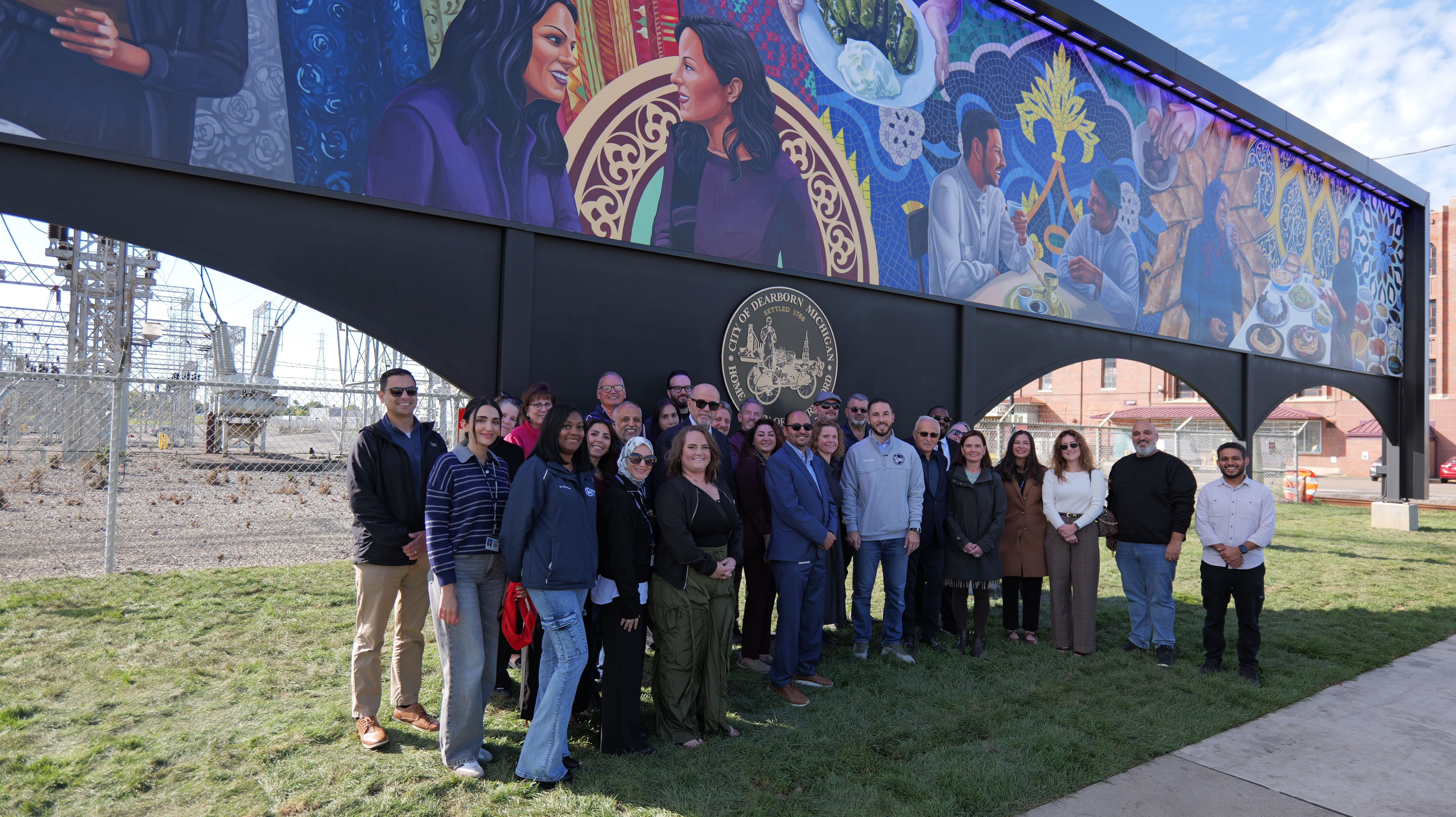 Mayor Abdullah H. Hammoud joined City officials, members of the Warren Business District Improvement Authority, and the artists behind the "Bridges of Culture" mural on Warren Ave at an official ribbon cutting ceremony, Oct. 6, 2026.