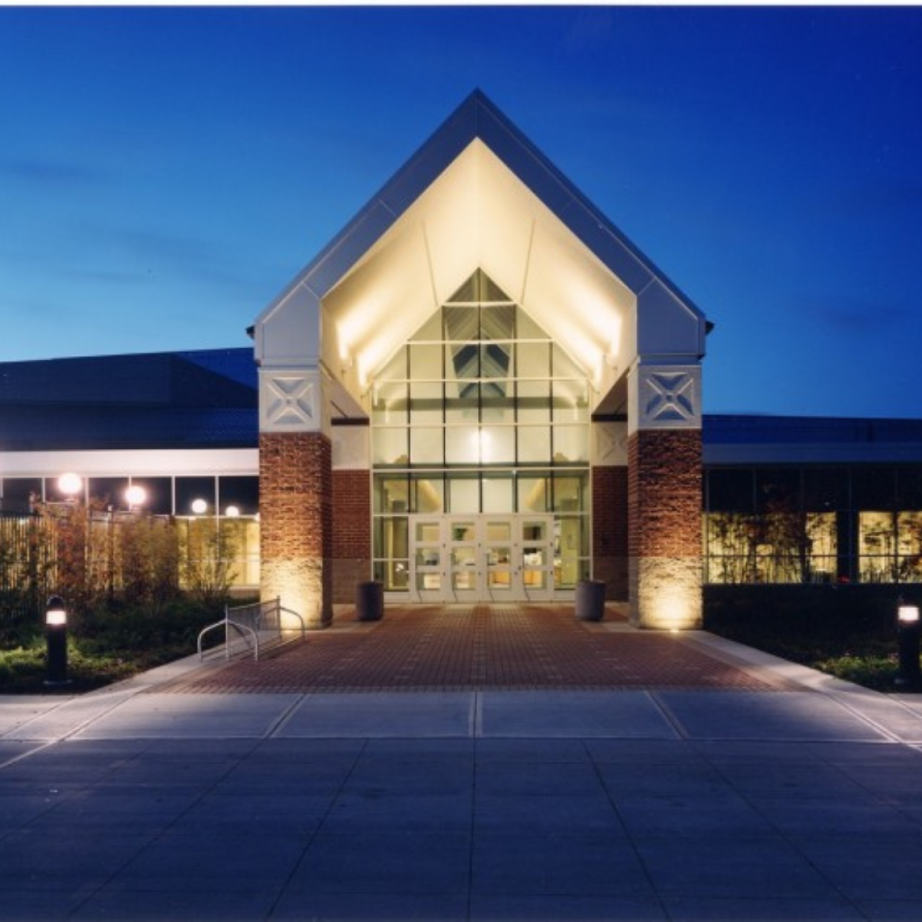 Photo: South entrance of the Ford Community & Performing Arts Center at night. 