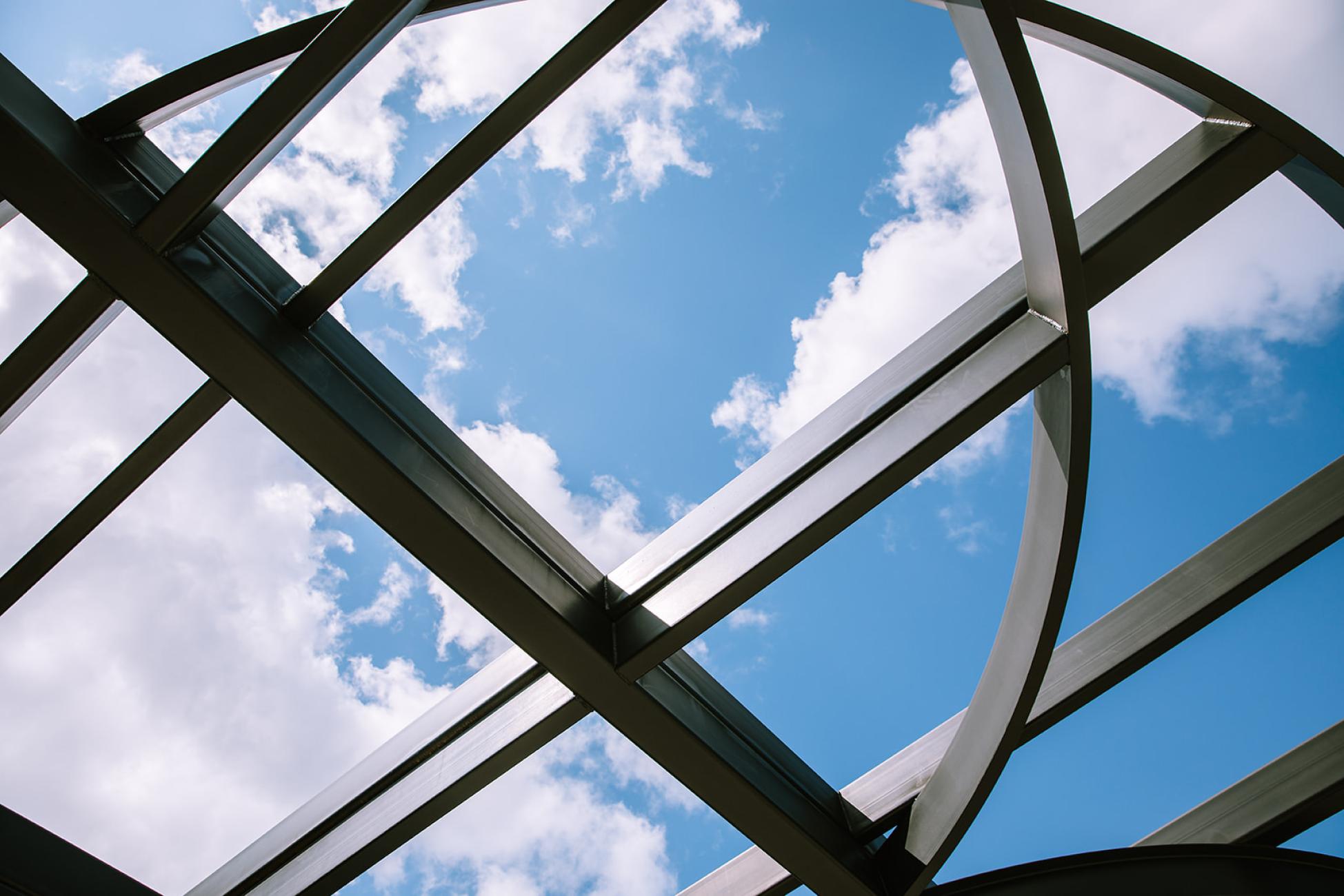Image of an artistic structure, blue skies at PEACE Park 1