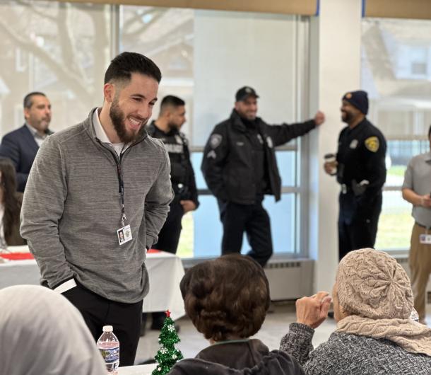 Mayor Hammoud speaks with residents at a senior housing luncheon