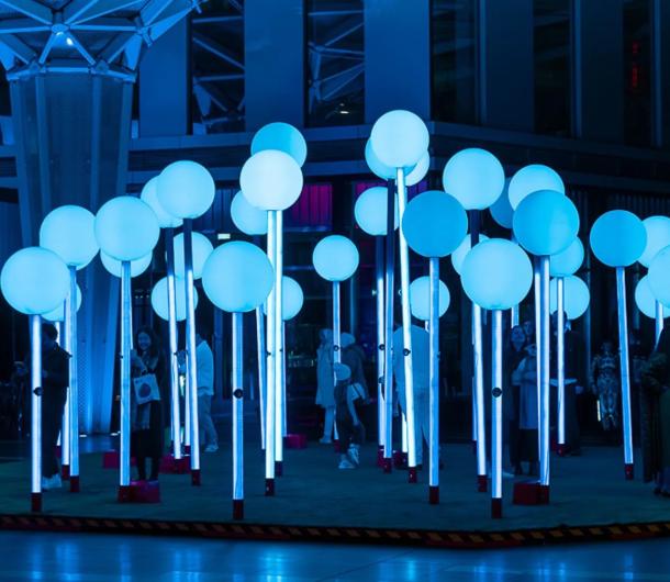 Illuminated light posts for holiday display. 